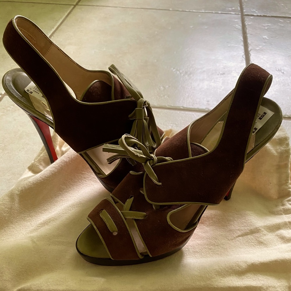 Christian Louboutin brown suede sandals.